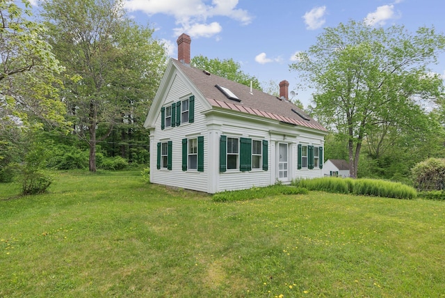 168 S Rd, Chebeague Island, ME 04017 - back of property with a chimney and a lawn