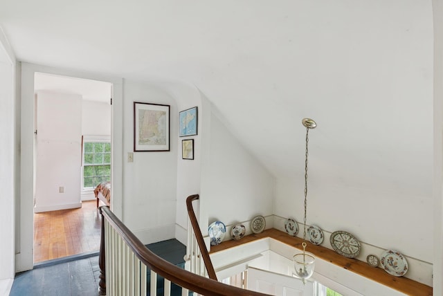 168 S Rd, Chebeague Island, ME 04017 - hallway featuring lofted ceiling, wood finished floors, and an upstairs landing