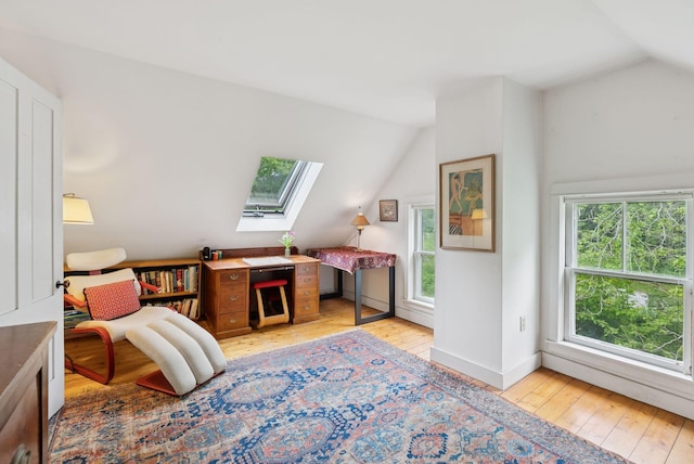 168 S Rd, Chebeague Island, ME 04017 - sitting room featuring a skylight, lofted ceiling, and light wood-type flooring