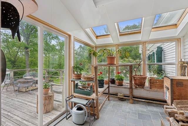 168 S Rd, Chebeague Island, ME 04017 - sunroom with a skylight, a deck, and lofted ceiling