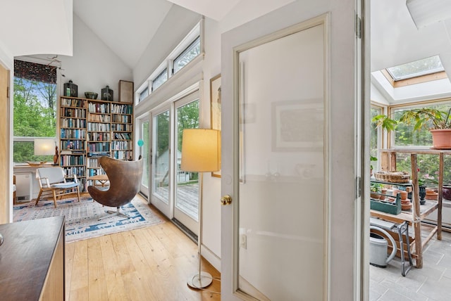 168 S Rd, Chebeague Island, ME 04017 - sitting room with a skylight, lofted ceiling, and light wood finished floors