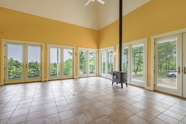 60 Cobb Rd, Belfast, ME 04915 - unfurnished sunroom featuring french doors, a wood stove, and a high ceiling