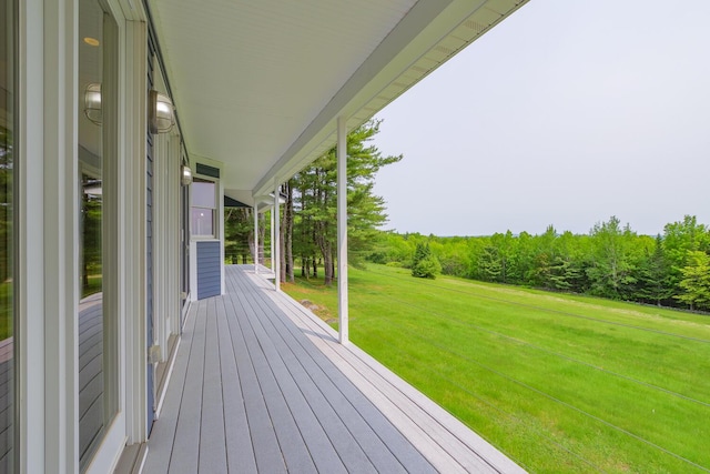 60 Cobb Rd, Belfast, ME 04915 - wooden porch featuring a lawn
