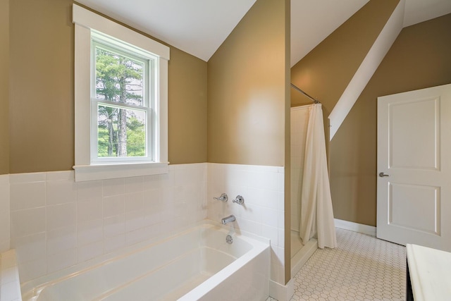 60 Cobb Rd, Belfast, ME 04915 - full bath with plenty of natural light, a garden tub, lofted ceiling, and a stall shower