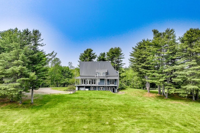 60 Cobb Rd, Belfast, ME 04915 - back of house featuring a yard and metal roof