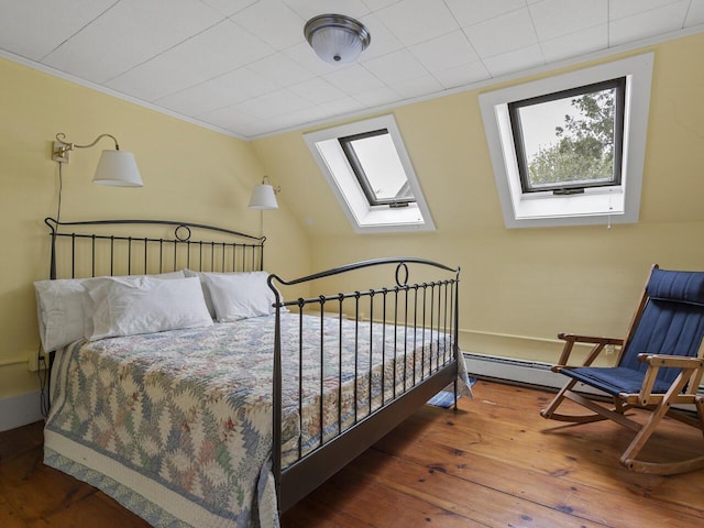 2593 Bristol Rd, Bristol, ME 04554 - bedroom with a skylight, multiple windows, hardwood / wood-style flooring, and crown molding