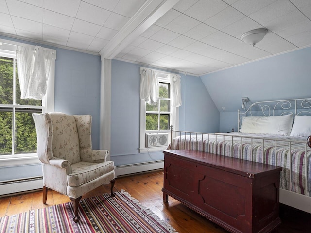 2593 Bristol Rd, Bristol, ME 04554 - bedroom with a baseboard radiator, vaulted ceiling, wood-type flooring, and ornamental molding