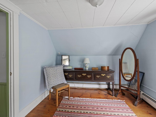 2593 Bristol Rd, Bristol, ME 04554 - living area with lofted ceiling, wood finished floors, and ornamental molding