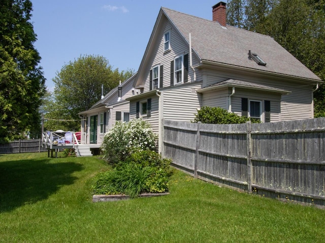 2593 Bristol Rd, Bristol, ME 04554 - back of house with a chimney, roof with shingles, and a wooden deck