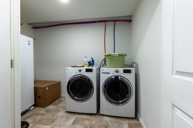 7 Bobcat Ln Unit 7, Berwick, ME 03901 - washroom with washer and clothes dryer and light stone finish flooring