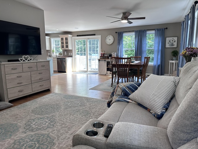 35 Knight Dr, Naples, ME 04055 - living room with light wood finished floors and ceiling fan