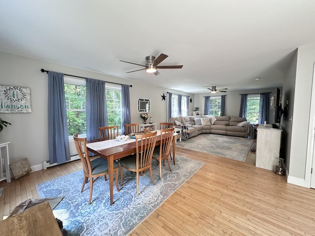 35 Knight Dr, Naples, ME 04055 - dining space with light wood-style flooring, healthy amount of natural light, and a ceiling fan