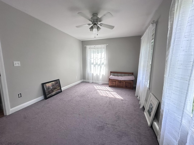 35 Knight Dr, Naples, ME 04055 - unfurnished bedroom with carpet floors and a ceiling fan