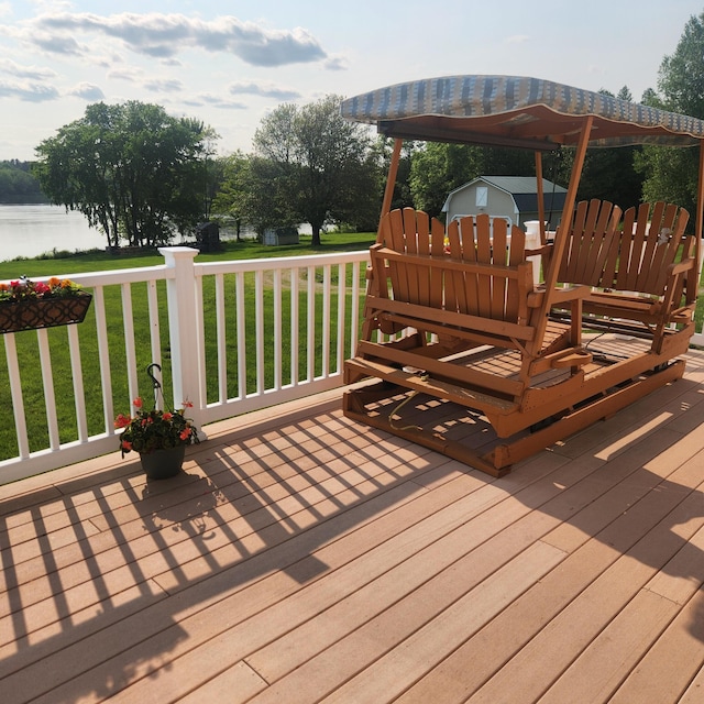 116 Main Rd, Passadumkeag, ME 04475 - wooden deck featuring a yard and a water view