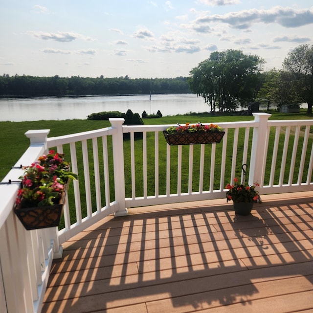 116 Main Rd, Passadumkeag, ME 04475 - wooden terrace featuring a water view and a lawn