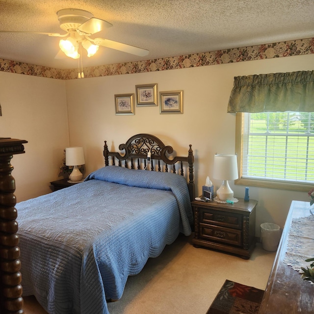 116 Main Rd, Passadumkeag, ME 04475 - carpeted bedroom with ceiling fan and a textured ceiling