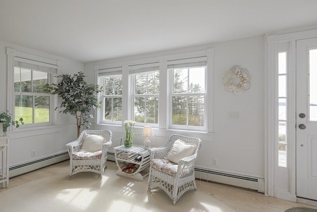 55 Ferry Rd, Swans Island, ME 04685 - foyer entrance with a baseboard heating unit and light wood finished floors