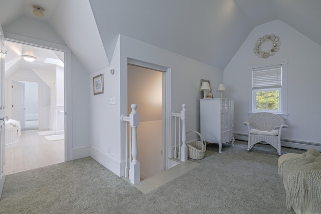 55 Ferry Rd, Swans Island, ME 04685 - carpeted bedroom featuring lofted ceiling and ensuite bath