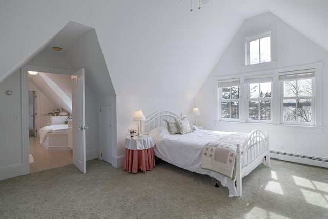 55 Ferry Rd, Swans Island, ME 04685 - carpeted bedroom featuring lofted ceiling and a baseboard heating unit