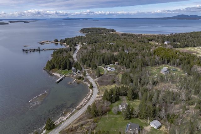 55 Ferry Rd, Swans Island, ME 04685 - aerial overview of property's location featuring a heavily wooded area and a large body of water