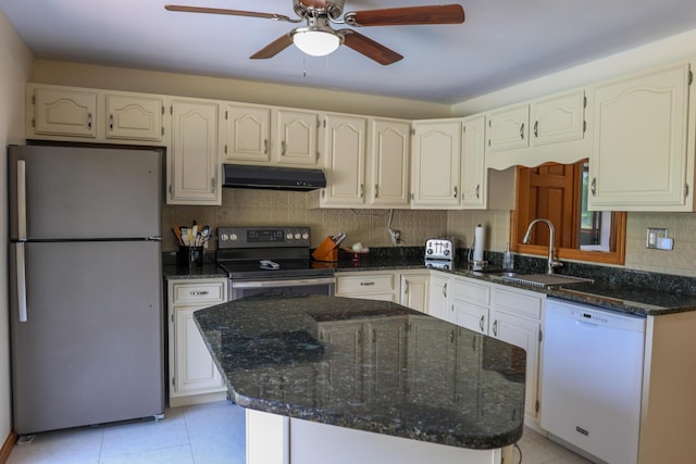 178 Clinton Ave, Winslow, ME 04901 - kitchen with freestanding refrigerator, white dishwasher, black range with electric stovetop, a sink, and under cabinet range hood