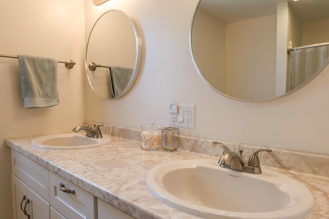 178 Clinton Ave, Winslow, ME 04901 - bathroom featuring double vanity