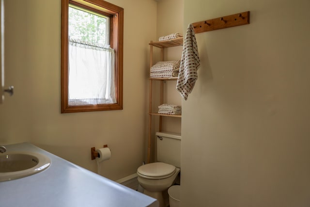 178 Clinton Ave, Winslow, ME 04901 - bathroom featuring toilet and a sink