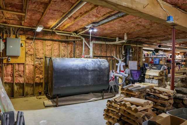 178 Clinton Ave, Winslow, ME 04901 - unfinished basement with oil tank and electric panel