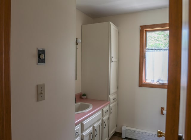 178 Clinton Ave, Winslow, ME 04901 - bathroom featuring vanity and baseboard heating
