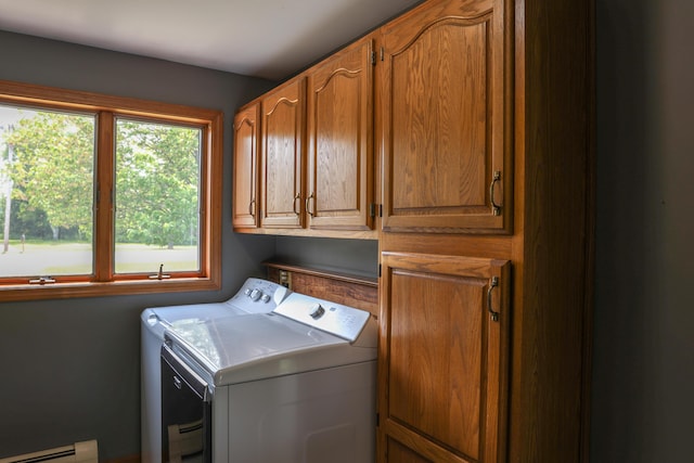 178 Clinton Ave, Winslow, ME 04901 - laundry room featuring separate washer and dryer, a baseboard heating unit, and cabinet space