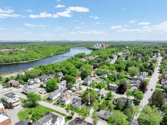32 Carroll St, Old Town, ME 04468 - aerial view of residential area featuring a large body of water and a forest