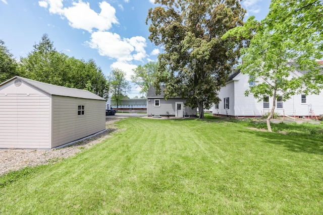 32 Carroll St, Old Town, ME 04468 - view of green lawn with an outdoor structure