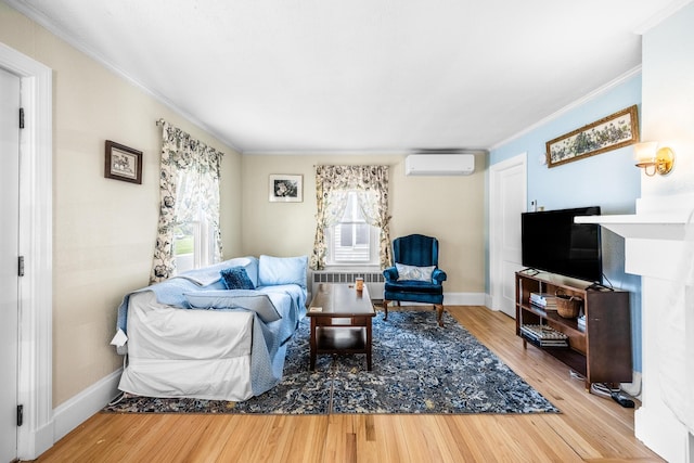 32 Carroll St, Old Town, ME 04468 - living room with a wall mounted air conditioner, ornamental molding, wood finished floors, and baseboards