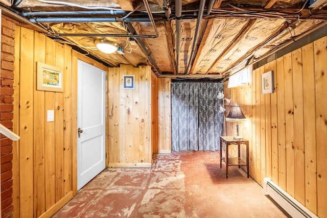 32 Carroll St, Old Town, ME 04468 - basement with a baseboard radiator and wood walls