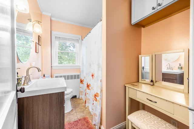 32 Carroll St, Old Town, ME 04468 - full bathroom featuring radiator heating unit, toilet, crown molding, vanity, and tile patterned flooring