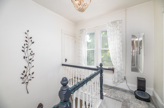 29 Zions Hill Rd, Dexter, ME 04930 - hallway featuring ornamental molding, a chandelier, and an upstairs landing