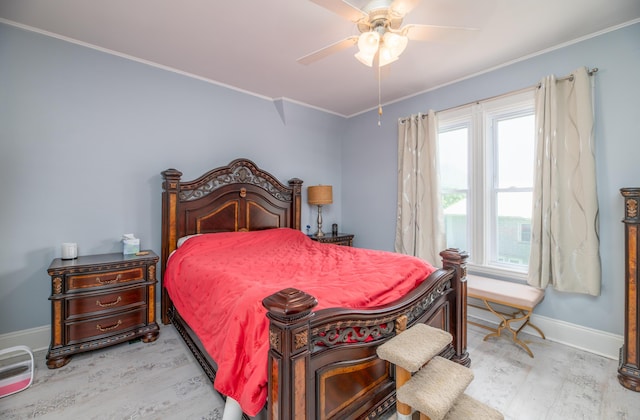 29 Zions Hill Rd, Dexter, ME 04930 - bedroom with wood finished floors, ornamental molding, multiple windows, and a ceiling fan