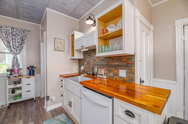 29 Zions Hill Rd, Dexter, ME 04930 - kitchen featuring white dishwasher, butcher block countertops, open shelves, decorative backsplash, and an ornate ceiling