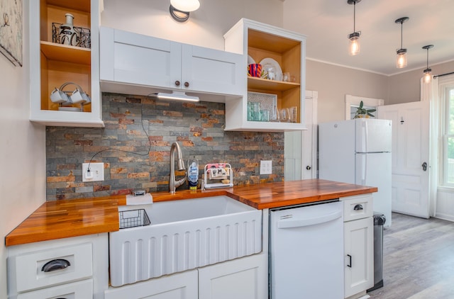 29 Zions Hill Rd, Dexter, ME 04930 - kitchen with butcher block counters, white appliances, open shelves, decorative backsplash, and light wood-type flooring