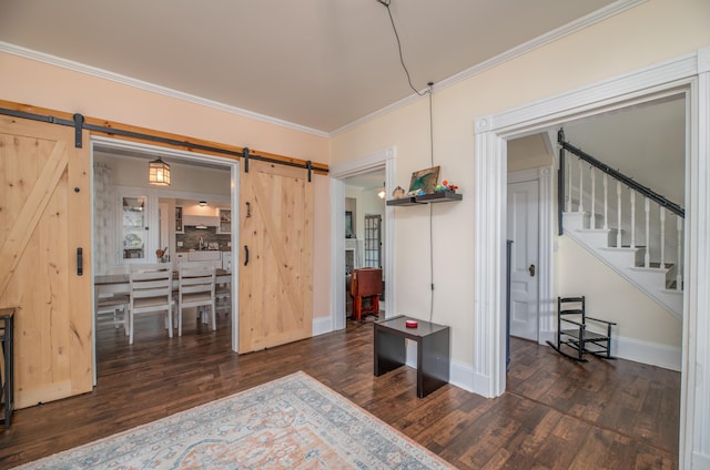 29 Zions Hill Rd, Dexter, ME 04930 - dining space featuring a barn door, wood finished floors, crown molding, and stairway