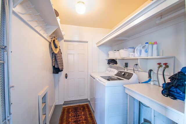 511 Main Rd, Phippsburg, ME 04562 - laundry room featuring washer and clothes dryer and baseboards