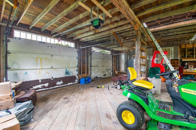 511 Main Rd, Phippsburg, ME 04562 - garage featuring a garage door opener