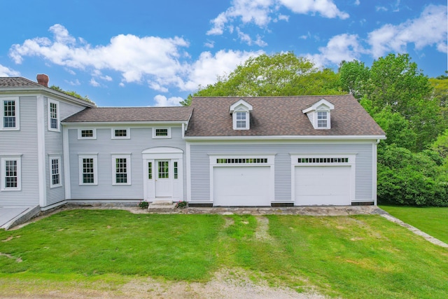 511 Main Rd, Phippsburg, ME 04562 - view of front of house featuring a front lawn, driveway, an attached garage, and roof with shingles