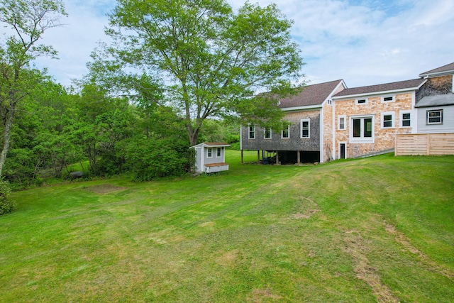 511 Main Rd, Phippsburg, ME 04562 - view of green lawn with a storage shed