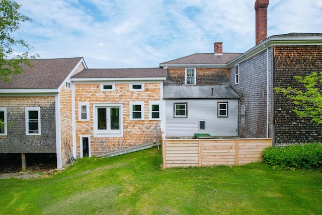 511 Main Rd, Phippsburg, ME 04562 - rear view of property featuring a chimney and a yard