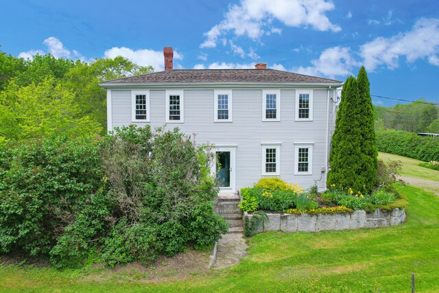 511 Main Rd, Phippsburg, ME 04562 - rear view of property featuring a chimney and a lawn