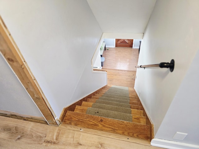 351 Maple St, Bangor, ME 04401 - staircase featuring wood finished floors and baseboards