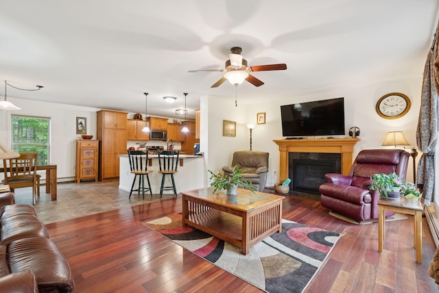 31 Knight Way N, Yarmouth, ME 04097 - living room with a glass covered fireplace, ceiling fan, and hardwood / wood-style floors