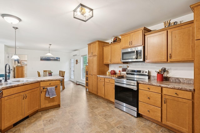 31 Knight Way N, Yarmouth, ME 04097 - kitchen with appliances with stainless steel finishes, decorative light fixtures, and brown cabinetry