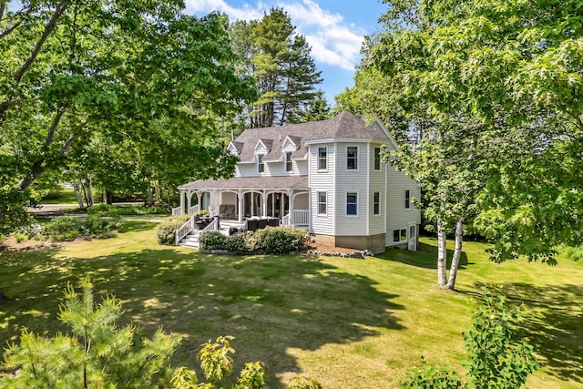 27 Highview Ter, Belfast, ME 04915 - victorian house with a porch, a front lawn, and roof with shingles